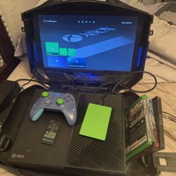 Xbox 1 with mobile case and 2TB external hard drive with 4 games