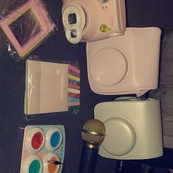 Instant camera is sold only twice used with two eating for it and different links for her and apart a microphone for phones