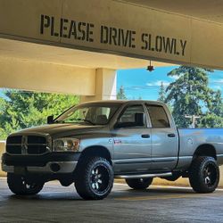 20x12 Wheels 8x6.5 Lug 33x12.5 Maxxis RAZR MT Tires