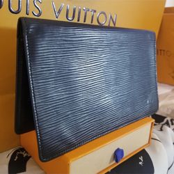 Louis Vuitton Wallet/Checkbook Holder (leather)