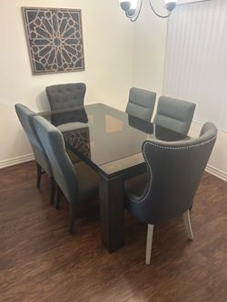 Ashley furniture Modern elegant dining room table with six chairs Modern elegant dining room table with six chairs