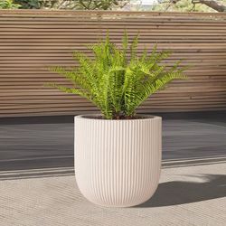 16" Pillar Fluted Planter - Handmade Fiberglass Composite Handmade pillar fluted fiberglass composite with a drainage hole and balanced form for indoo