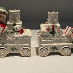  New never used Pair of Lenox Holiday Toy Train This very nice Bone China Train Candle Holder's features a Boy and Girl Elf loading presents on the Tr