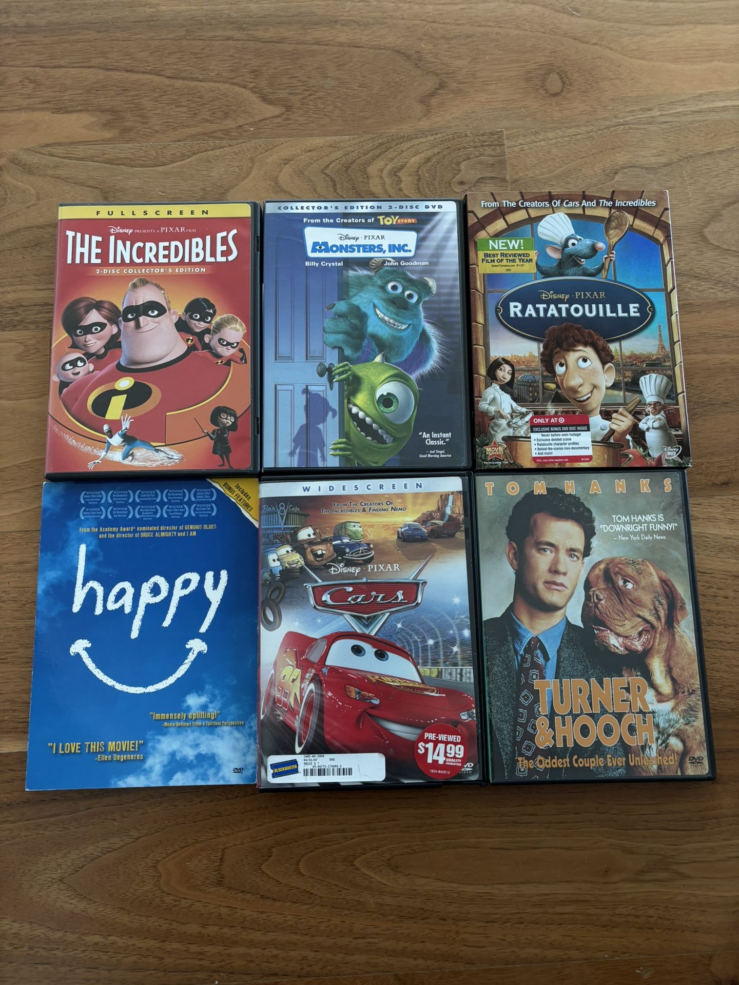 DVDs Pixar Cars, Monster Inc., Ratotouille, The Incredibles, Turner & Hooch, Happy
