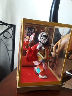 Vintage Japanese doll in glass case