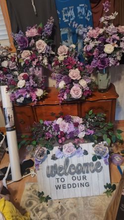 Lavender/ Purple wedding flower arrangements plus