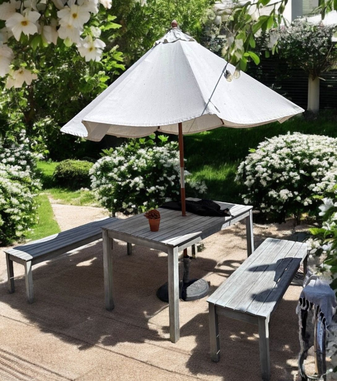 Outdoor Table with 2 benches and umbrella