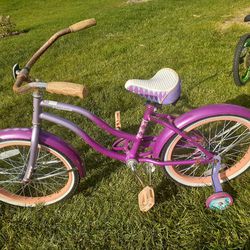 Purple 20in Huffy Bicycle With Training Wheels