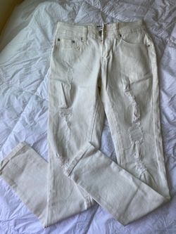 white ripped jeans