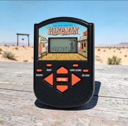 1995 Milton Bradley Hangman Electronic Handheld Game W/Batteries TESTED WORKING In Excellent Condition. This is a vintage 1995 Milton Bradley Electron