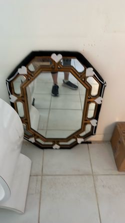 Gold tone mirror