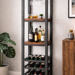 Modern industrial style bar cabinet / wine tower  Features: • Built-in hanging stemware rack (holds wine glasses upside down) • Lower wine bottle rack