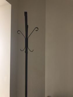 Dark brown metal coat rack
