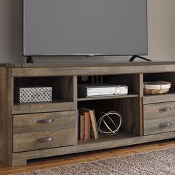 Ashley TV stand.   New in box