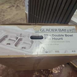 Glacier Bay
33 in. Drop-In 50/50 Double Bowl 20 Gauge Stainless Steel Kitchen Sink with Faucet