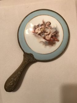 Antique Enamel and brass mirror