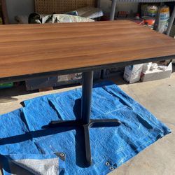 Wood table with metal base 