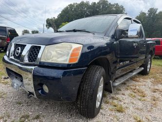 2006 Nissan Titan 4x4.  Crew cab Only $3,500