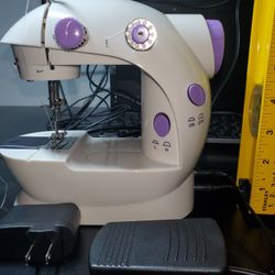 working sewing machine JYSM-202A and accessories, 49 needles, 5 robins, 1 threader, threads, 1 tini cissor, 2 regular needles etc.
easy to use.  YouTu
