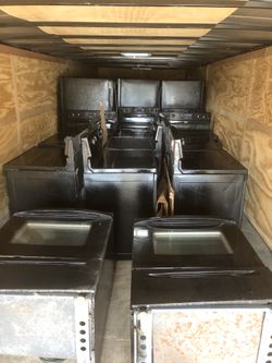Truck load black kitchen appliance sets