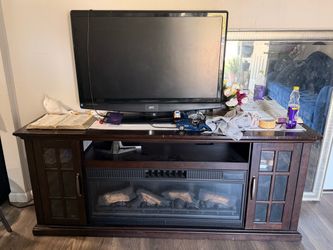 TV with Fire Place Cabinet
