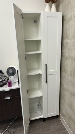 2 white Cabinets