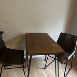 Small Table With 2 Leather Chairs