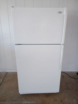 Whirlpool, White Refrigerator. Wide33"    Depth 29"   Tall65"1/2