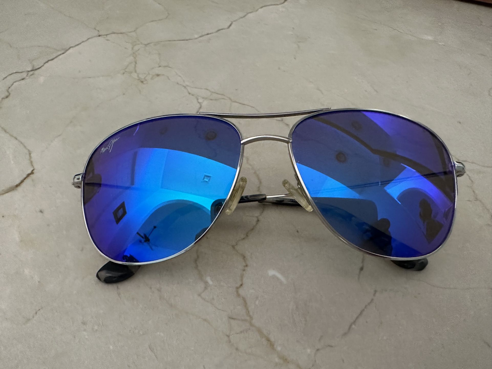 Maui Jim Polarized Sunglasses. Silver Frames.