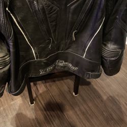 Leather motorcycle jacket large size used still got a lot of wearing it padded leather neck