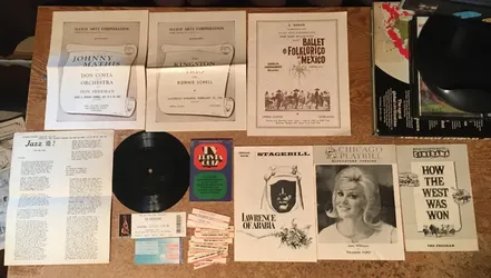 Musical and theater lot of six playbills Lawrence of Arabia how the West was won flexi disc theater tickets and jukebox slips full list