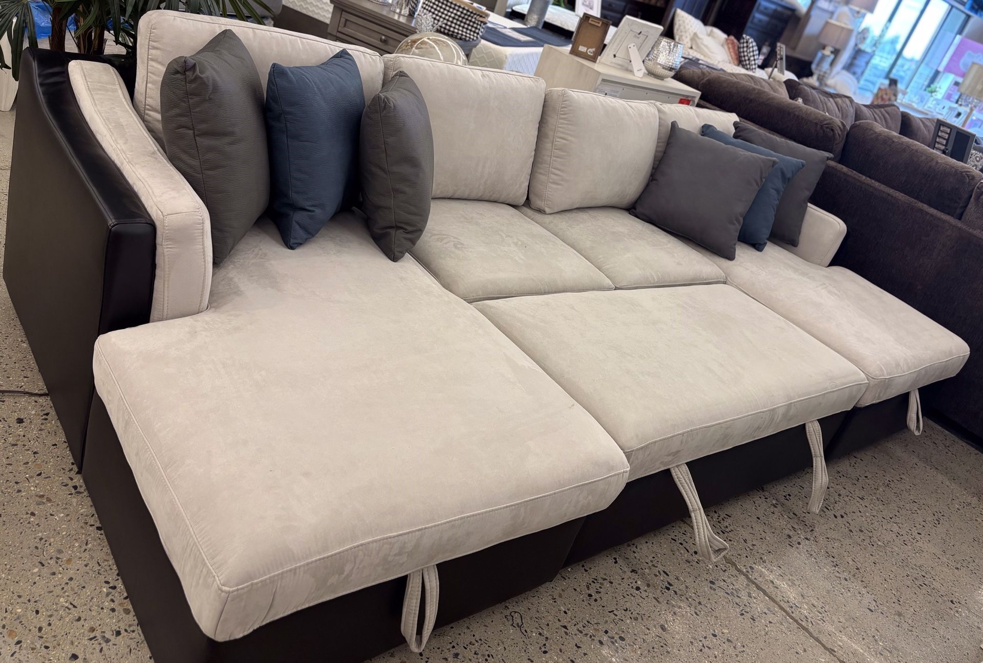 Beautiful Sectional With Pull Out Sleeper And Storage 