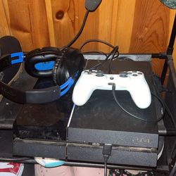 PlayStation 4 with controller and headset