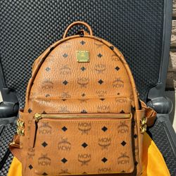 MCM Brown Backpack with Iconic Monogram and Metal Studs