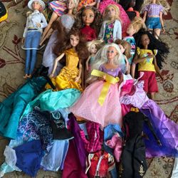 Lot of Barbie dolls and clothes