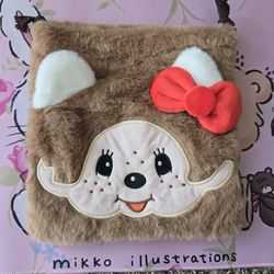 Monchichi with red bow pouch