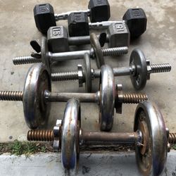 Lot Of Dumbells And Bar Weights
