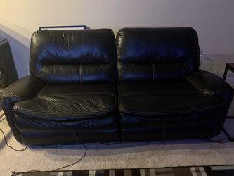 Faux leather recliner sofa and love seat set