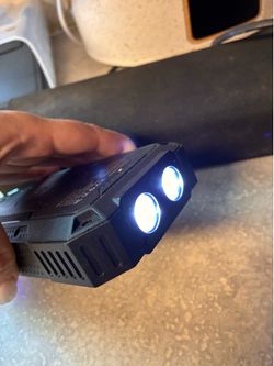 Portable charger with four hook ups and a wireless charger