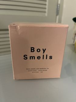 Boy Smells Candle