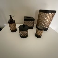 Accessories set for bathroom.  Waste basket, soap dispenser, kleenex Dispenser,  drinking cup, Q-tip holder with lid.  Used, in great shape.