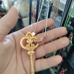Key With Large Long Gold And Silver Necklace