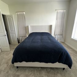 Upholstered Wingback Bed