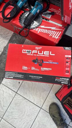 Milwaukee 1 inch impact with 2 force battery and fast charger