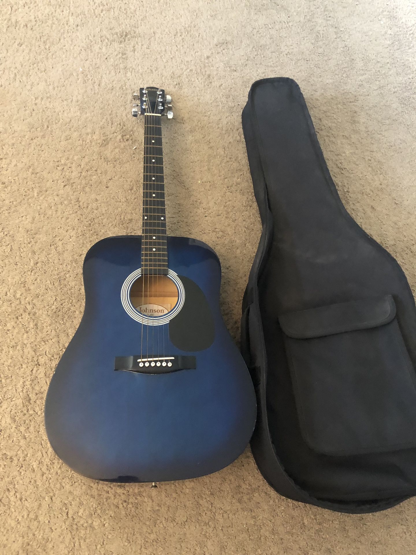 Acoustic guitar with bag