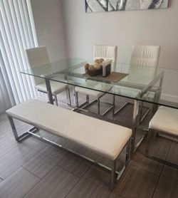 Juego de comedor vidrio templado + sillas y banqueta de cuero sintético