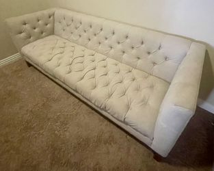 Tufted Beige Sofa with Wooden Base