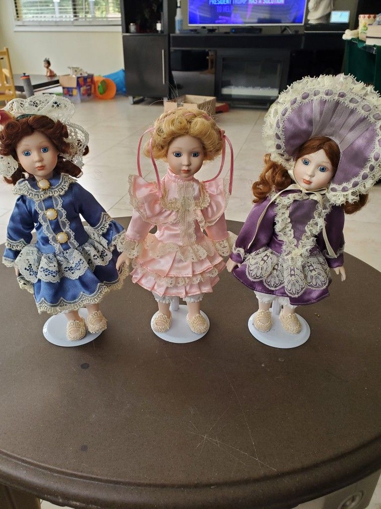 11 -NEW 5" Tall Porcelain Dolls On Stands $5 Each