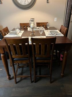 Dining room table with 8 chairs.