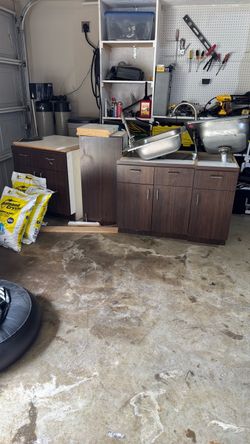 OFFER PLS …Cabinet extra with 2 utility sinks